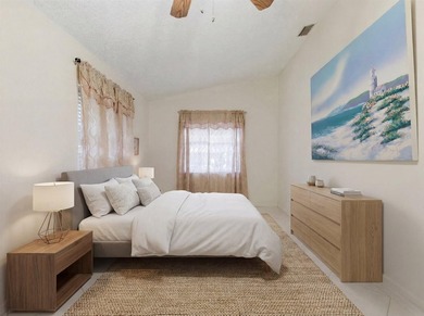 Welcome to this charming three-bedroom, two-bathroom residence - photo 25