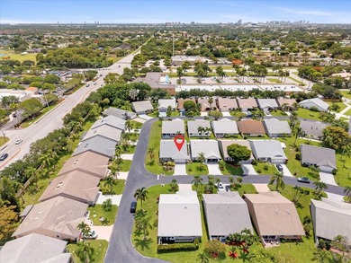 Welcome to this charming three-bedroom, two-bathroom residence - photo 43