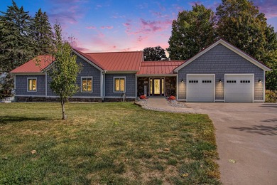 Discover luxury lakeside living in this custom-built 3-bedroom - photo 3