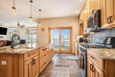 Discover luxury lakeside living in this custom-built 3-bedroom - photo 7