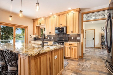 Discover luxury lakeside living in this custom-built 3-bedroom - photo 8