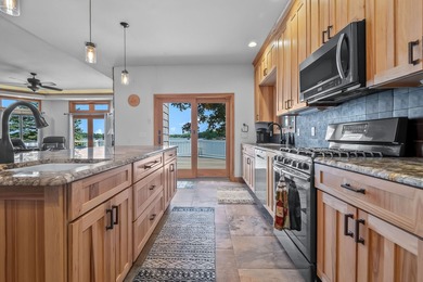 Discover luxury lakeside living in this custom-built 3-bedroom - photo 9