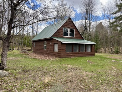 Tucked away at the end of a dead-end road, this off-grid camp - photo 6