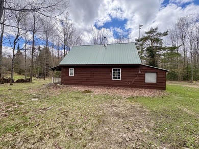 Tucked away at the end of a dead-end road, this off-grid camp - photo 8