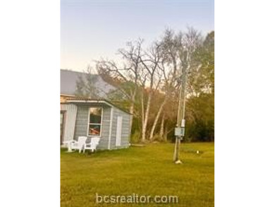 Come take a look at this waterfront lot. Has a small cabin - photo 9