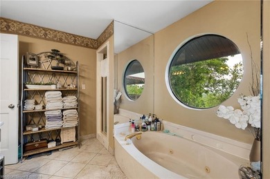 Enjoy elegant living in this one-of-a-kind home nestled in the