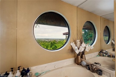 Enjoy elegant living in this one-of-a-kind home nestled in the