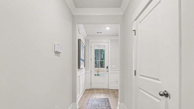*4 bedrooms, 2.5 baths *Welcoming front porch and screened in - photo 3