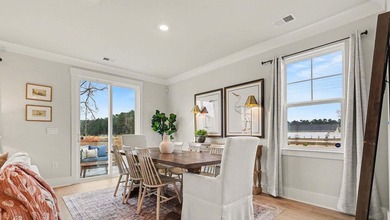 *4 bedrooms, 2.5 baths *Welcoming front porch and screened in - photo 7