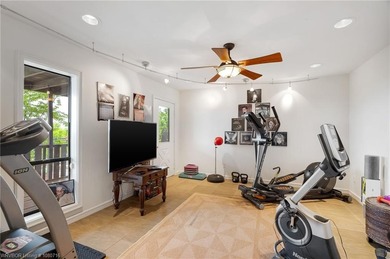 Enjoy elegant living in this one-of-a-kind home nestled in the