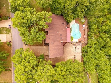 Enjoy elegant living in this one-of-a-kind home nestled in the