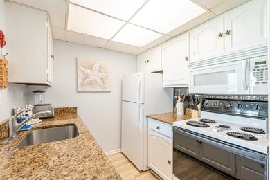 This condo has had updates that will please any buyer looking - photo 3