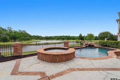 This extraordinary estate is located in the gated community of - photo 1