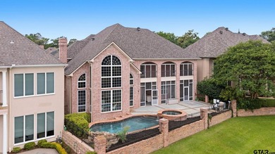 This extraordinary estate is located in the gated community of - photo 3