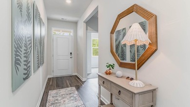 Experience the Kerry floor plan offering an open layout, 9 foot - photo 2