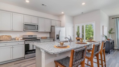 Experience the Kerry floor plan offering an open layout, 9 foot - photo 3