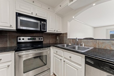 UNIT 105 - BEAUTIFUL FIRST FLOOR UNIT. DOWNTOWN LIVING AT ITS - photo 1