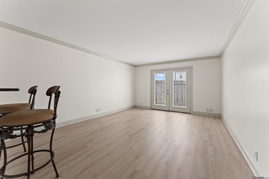 UNIT 105 - BEAUTIFUL FIRST FLOOR UNIT. DOWNTOWN LIVING AT ITS - photo 2