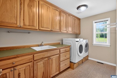 This spacious 4-bedroom, 3-bath home is located in one of - photo 12