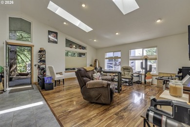 This inviting 3-bedroom, 2-bath home features an open-concept - photo 5