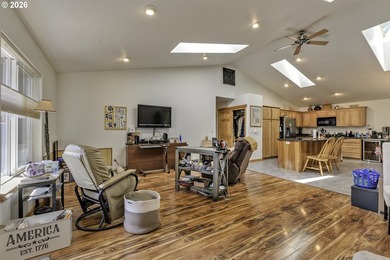 This inviting 3-bedroom, 2-bath home features an open-concept - photo 6