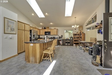 This inviting 3-bedroom, 2-bath home features an open-concept - photo 8
