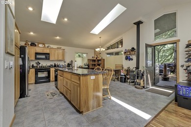 This inviting 3-bedroom, 2-bath home features an open-concept - photo 9
