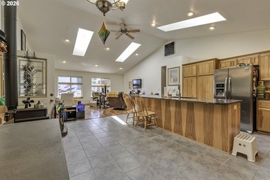This inviting 3-bedroom, 2-bath home features an open-concept - photo 10