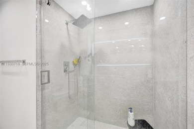 Originally a 2-bedroom, 2-bath, this corner unit in Turnberry - photo 22