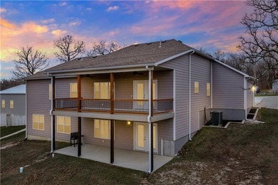 This expansive home in Warsaw, MO offers a blend of comfort and - photo 2