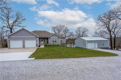 This expansive home in Warsaw, MO offers a blend of comfort and - photo 3