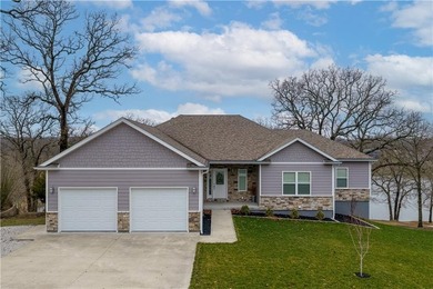 This expansive home in Warsaw, MO offers a blend of comfort and - photo 4