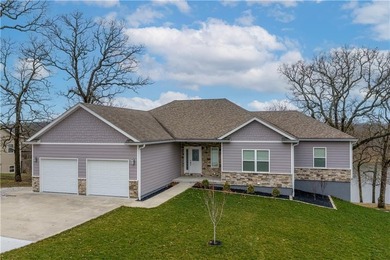 This expansive home in Warsaw, MO offers a blend of comfort and - photo 6