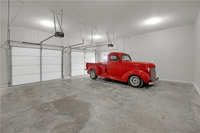 This expansive home in Warsaw, MO offers a blend of comfort and - photo 9