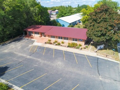 This impeccably maintained commercial property offers a - photo 2