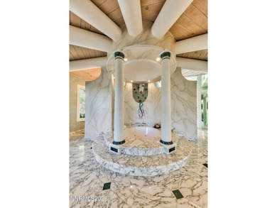 A spectacular private gated estate perched atop Round Hill in - photo 8