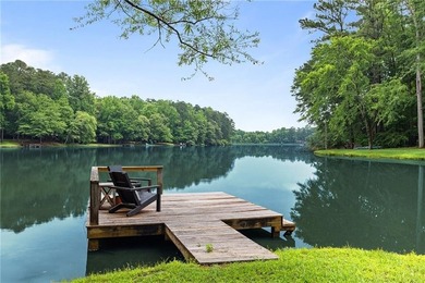 Absolutely charming and timeless, this classic lake cabin is - photo 11