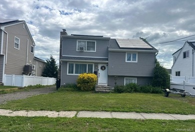 This Split Level Style Home Features 4 Bedrooms, 2 Full Baths - photo 1