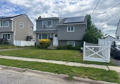 This Split Level Style Home Features 4 Bedrooms, 2 Full Baths - photo 2