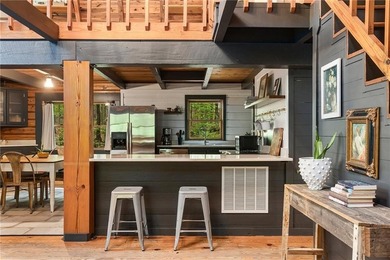Absolutely charming and timeless, this classic lake cabin is - photo 23
