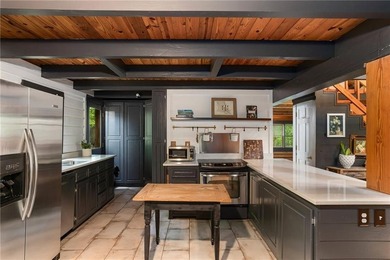 Absolutely charming and timeless, this classic lake cabin is - photo 26