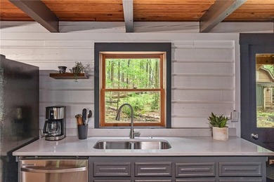 Absolutely charming and timeless, this classic lake cabin is - photo 30