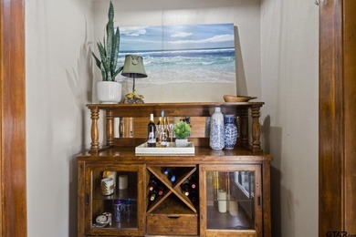 SELLER IS OFFERING $20,000 REMODEL ALLOWANCE. Tucked away on the - photo 5