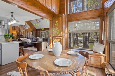 SELLER IS OFFERING $20,000 REMODEL ALLOWANCE. Tucked away on the - photo 10