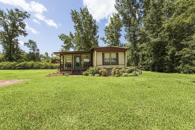 Move right into this immaculately maintained 1980 mobile home - photo 4