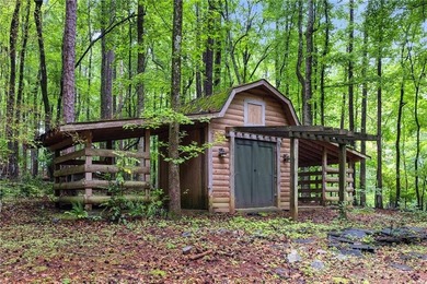 Absolutely charming and timeless, this classic lake cabin is - photo 48