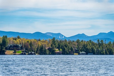 Nestled among towering pines on the shores of Buck Island on - photo 2