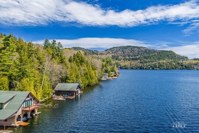 Nestled among towering pines on the shores of Buck Island on - photo 3