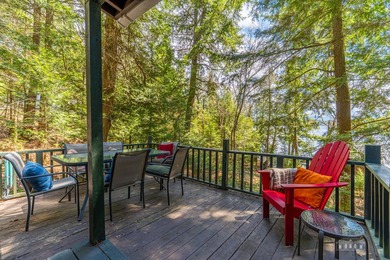 Nestled among towering pines on the shores of Buck Island on - photo 8