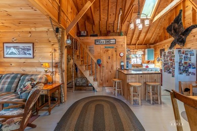 Nestled among towering pines on the shores of Buck Island on - photo 10